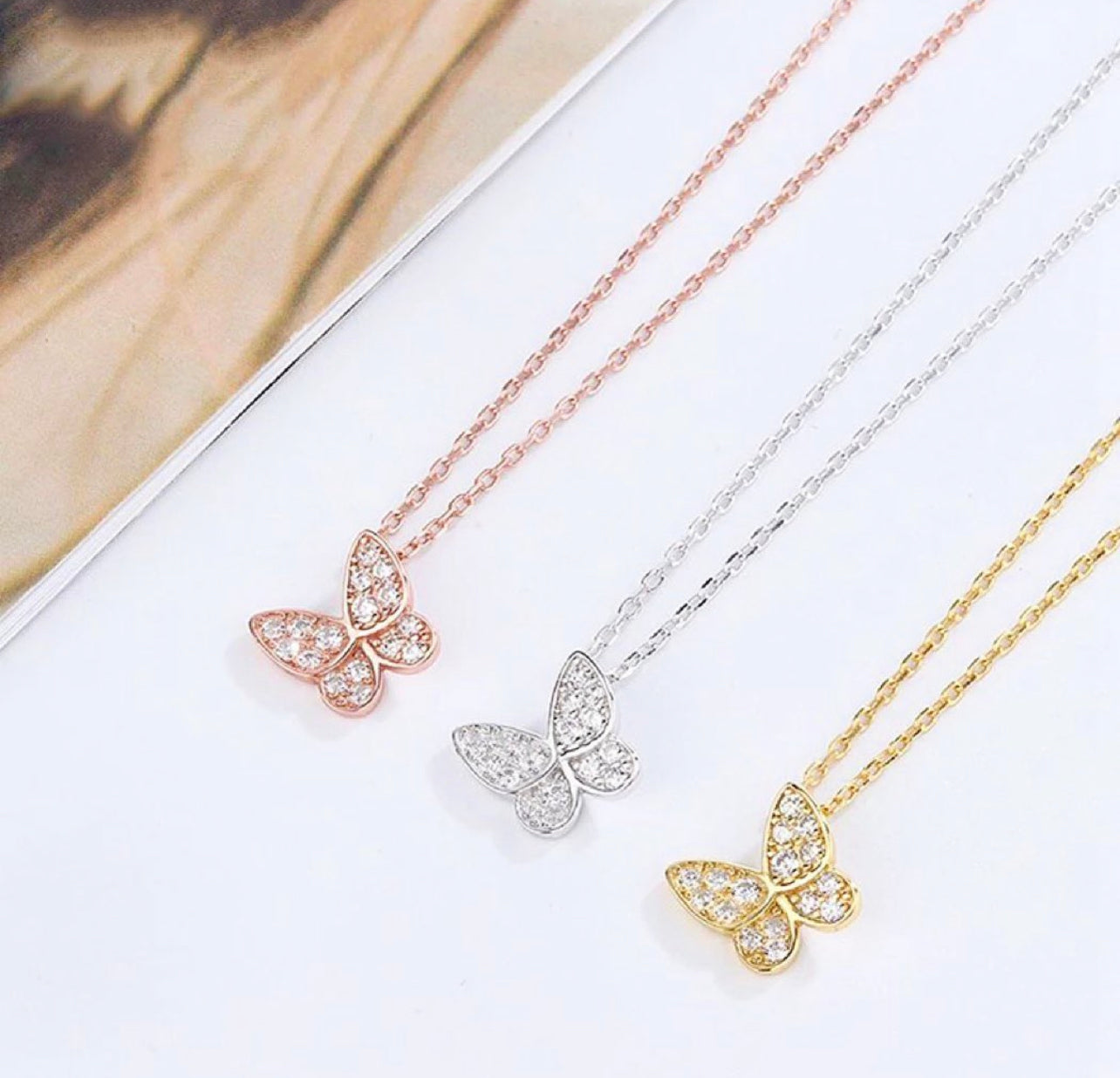 Sparkly and delicate, we love this Mini Butterfly Necklace!